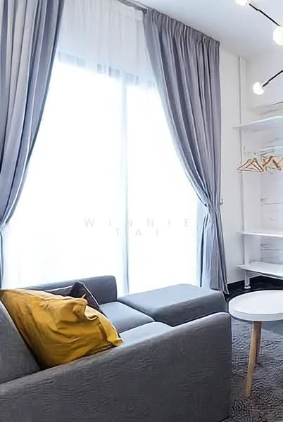 Living features: grey fabric sofa, yellow throw pillow, white round coffee table, floor-to-ceiling windows, sheer curtains, grey carpet flooring, open shelving, clothes hangers; style: modern.