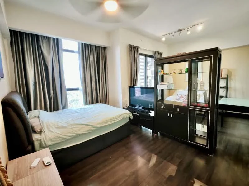 Bedroom features: king-size bed with upholstered headboard, floor-to-ceiling windows, grey curtains, dark wood flooring, ceiling fan with light, black TV console, glass display cabinet, wall-mounted TV, decorative items on shelves, study desk, light-colored bedding; style: modern; view: city.