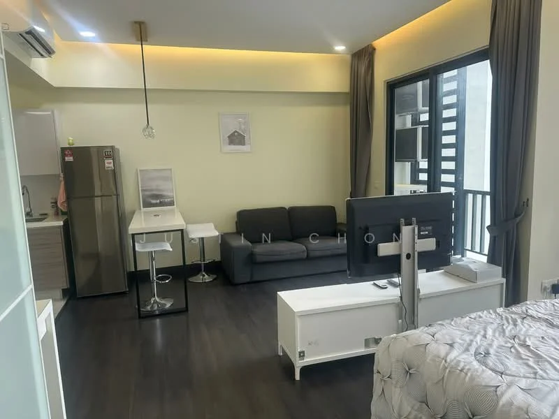 Living features: grey fabric sofa, white coffee table, wall-mounted TV, TV console, recessed LED downlights, floor-to-ceiling windows, curtains, dark wood flooring, open layout to kitchen, bar stools at counter, kitchen appliances visible; style: modern. Kitchen features: stainless-steel fridge, white cabinetry, countertop with bar seating, built-in oven, cooktop, exhaust hood; style: modern.