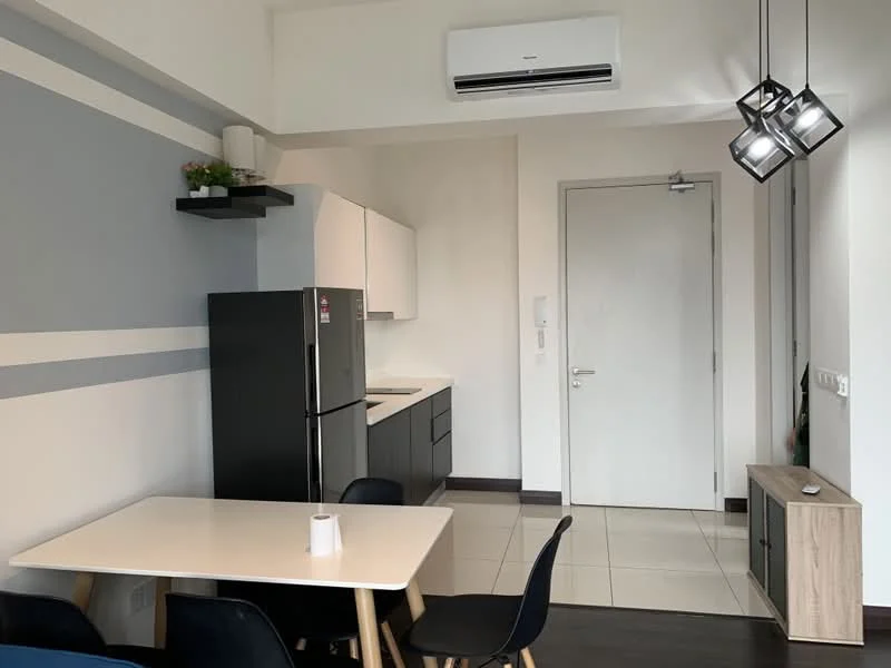 Kitchen features: black cabinetry, white countertop, stainless-steel fridge, built-in oven, ceramic tile flooring, recessed downlights, wall-mounted split AC, dining table with white surface, black dining chairs, grey accent wall, door to hallway; style: modern.