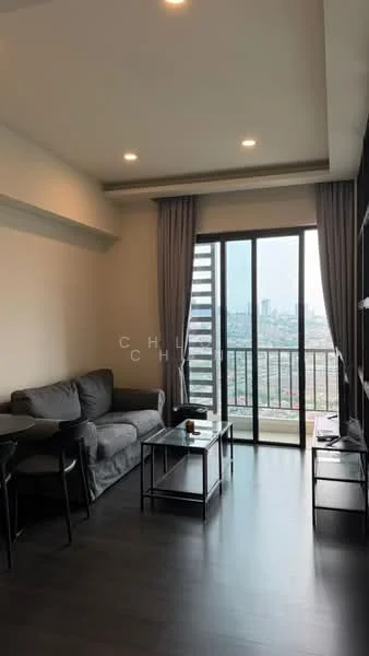 Living features: grey fabric sofa, black coffee table, black side table, floor-to-ceiling windows, curtains, wooden flooring, city view, wall-mounted TV, black TV console; style: modern; view: city.