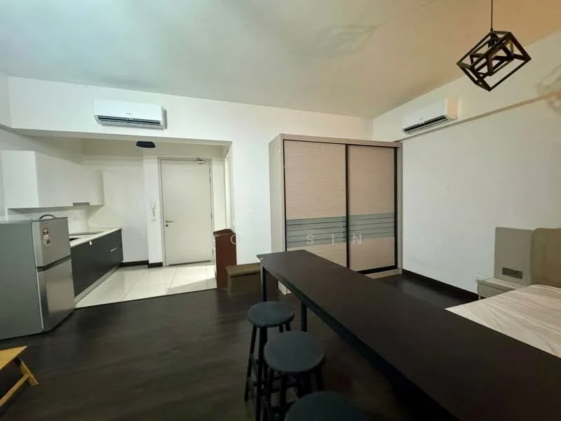 Room features: white painted walls, dark wood flooring, recessed downlights, 2 wall-mounted split AC units, kitchenette with white cabinetry, stainless-steel fridge, built-in wardrobe with sliding doors, black dining table, 3 black stools, bed with upholstered headboard; style: modern.