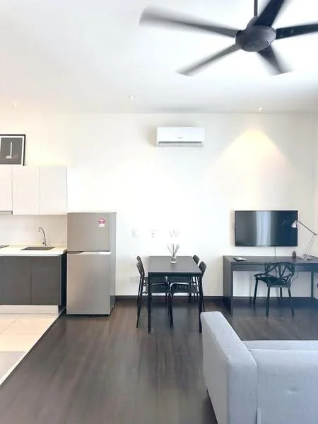Living features: grey fabric sofa, black dining table for four, black dining chairs, wall-mounted TV, desk with chair, refrigerator, single-bowl stainless-steel sink, chrome pull-down faucet, white cabinetry, dark grey lower cabinets, wall-mounted split AC, ceiling fan with light, light-colored tile flooring, white painted walls; style: modern.