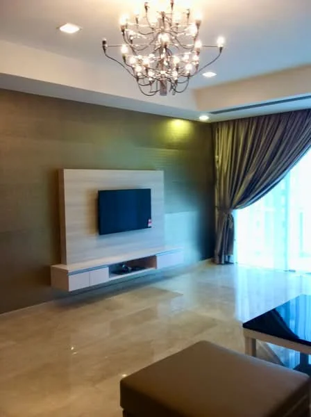 Living features: chandelier, wall-mounted TV, wooden TV console, cream marble flooring, floor-to-ceiling windows, sheer curtains, accent wall with textured finish, recessed lighting; style: modern; view: city.