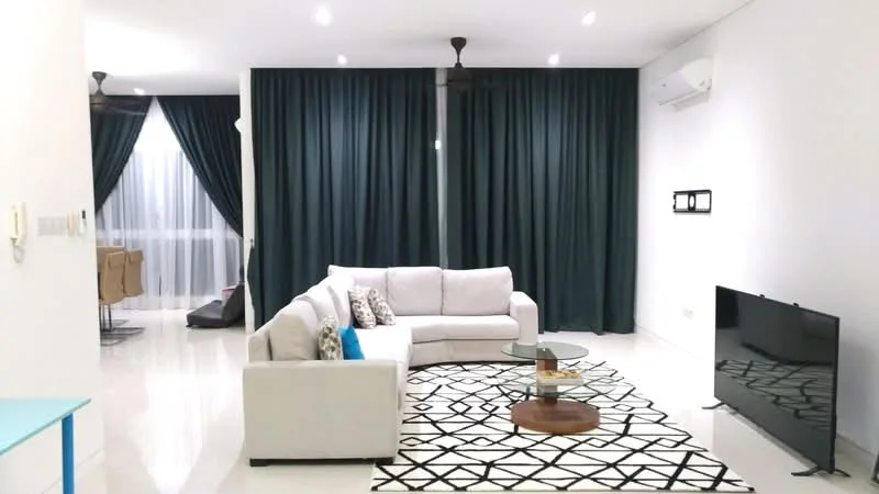Living features: 3-seater fabric sofa in light grey, decorative throw pillows, glass coffee table, area rug with geometric pattern, wall-mounted TV, ceiling fan with light, white painted walls, glossy tile flooring, floor-to-ceiling windows with sheer curtains, dark green curtains, air conditioning unit; style: modern.