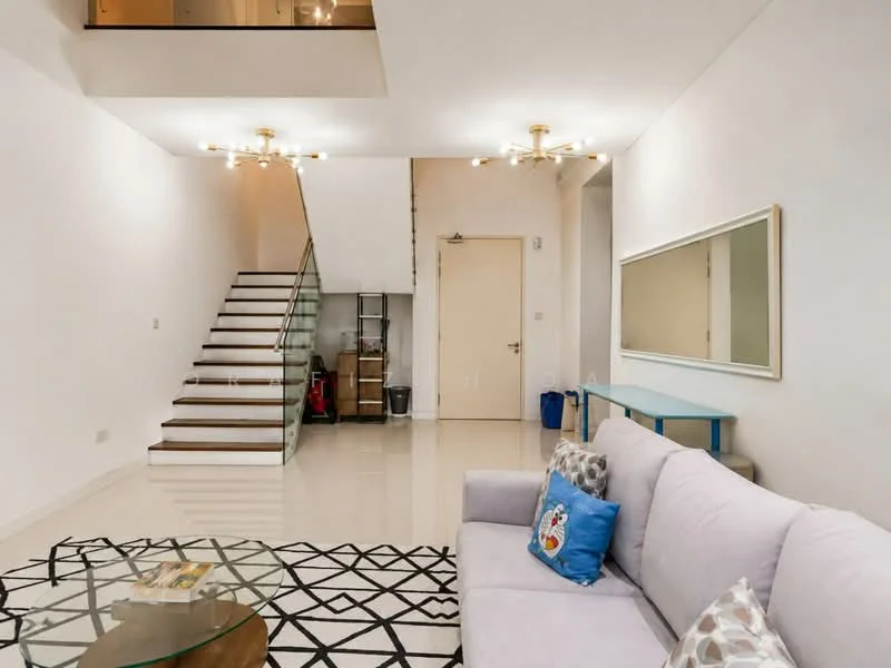 Living features: light grey fabric sofa, decorative throw pillows, glass coffee table with geometric pattern, white painted walls, polished tile flooring, recessed downlights, chandelier with multiple bulbs, full-length mirror, blue console table, staircase with wooden steps and glass railing; style: modern.
