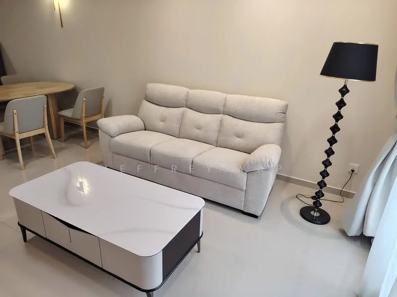 Living features: 3-seater fabric sofa in light grey, coffee table with white top and black base, floor lamp with black shade and twisted base, light-coloured walls, neutral-toned flooring, decorative wall sconce, round dining table in background, 4 dining chairs in light wood; style: modern.