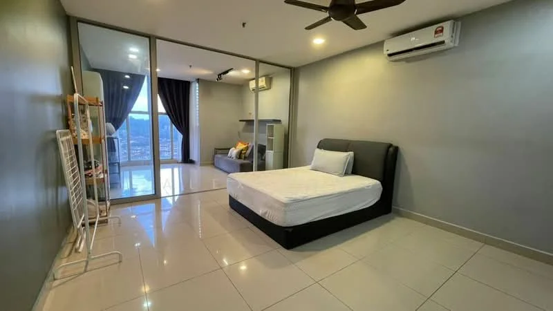 Bedroom features: queen-size bed, black upholstered headboard, white bed linens, wall-mounted split AC, ceiling fan, large glass sliding door, grey painted walls, glossy tile flooring, floor-to-ceiling windows, black curtains, sofa in living area visible, decorative shelving unit, natural light from windows; style: modern; view: city.