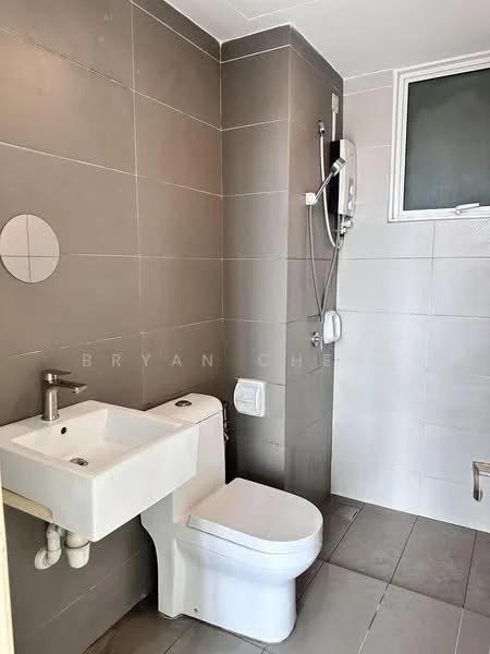 Bathroom features: grey tiled walls, white ceramic sink, chrome basin mixer faucet, white toilet, shower with handheld showerhead, shower wall with grey tiles, window for natural light, grey tiled flooring; style: modern.
