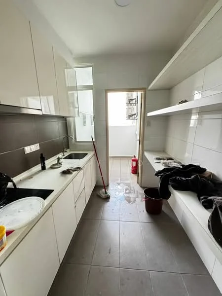 Kitchen features: white cabinetry, grey tiled backsplash, double-bowl stainless-steel sink, chrome pull-down faucet, white countertop, open shelving, grey floor tiles, window for natural light, mop and bucket visible, cleaning supplies visible; style: modern.
