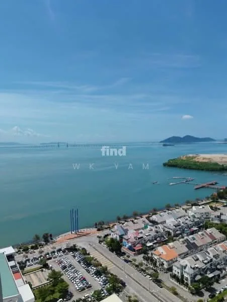 Exterior features: waterfront view, city skyline in background, clear blue sky, green landscape, boats visible in water, highway or road visible, urban residential area; style: modern.