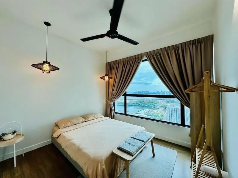 Bedroom features: king-size bed with beige bedding, 2 pendant lamps with woven shades, floor-to-ceiling window with city view, light brown wooden flooring, curtains in light brown fabric, wooden bench at foot of bed, clothes rack, decorative plant on small table; style: modern; view: city.