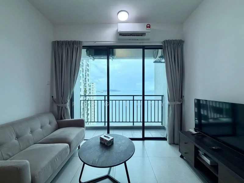 Living features: grey fabric 3-seater sofa, round black coffee table, wall-mounted TV, TV console, floor-to-ceiling sliding glass door, sheer curtains, air conditioning unit, light fixture on ceiling, tile flooring, balcony view of the sea; style: modern; view: sea.