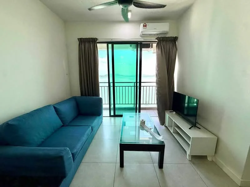 Living features: blue fabric sofa, glass coffee table, white TV console, wall-mounted TV, floor-to-ceiling sliding glass door, curtains, air conditioning unit, tile flooring, ceiling fan; style: modern; view: sea.