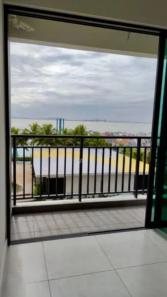 Room features: sliding glass door, balcony with railing, floor-to-ceiling windows, sea view, paved flooring, overhead ceiling, tropical landscaping visible, city skyline in background; style: modern; view: sea.