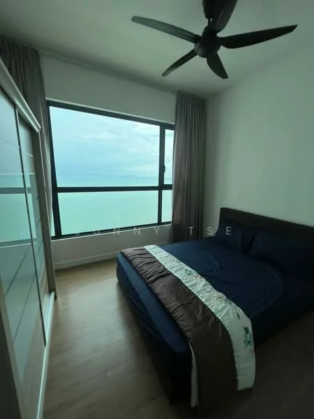 Bedroom features: king-size bed with blue bedding, floor-to-ceiling windows, ocean view, light wood flooring, ceiling fan, curtains, built-in wardrobe with sliding doors, decorative throw on bed; style: modern; view: sea.
