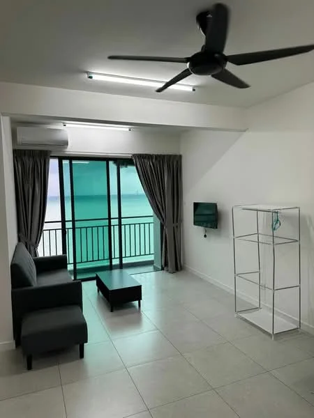 Living features: floor-to-ceiling windows, sliding glass door, grey fabric sofa, black coffee table, wall-mounted TV, curtains in grey, ceiling fan, air conditioning unit, light-colored tile flooring, white walls; style: modern; view: sea.