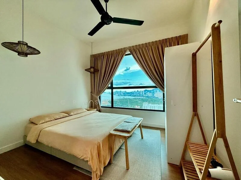 Bedroom features: king-size bed with beige bedding, wooden bed frame, floor-to-ceiling window with city view, sheer curtains, dark wood flooring, ceiling fan with light, wooden bench at foot of bed, decorative pendant light, wall-mounted coat rack, area rug; style: modern; view: city.