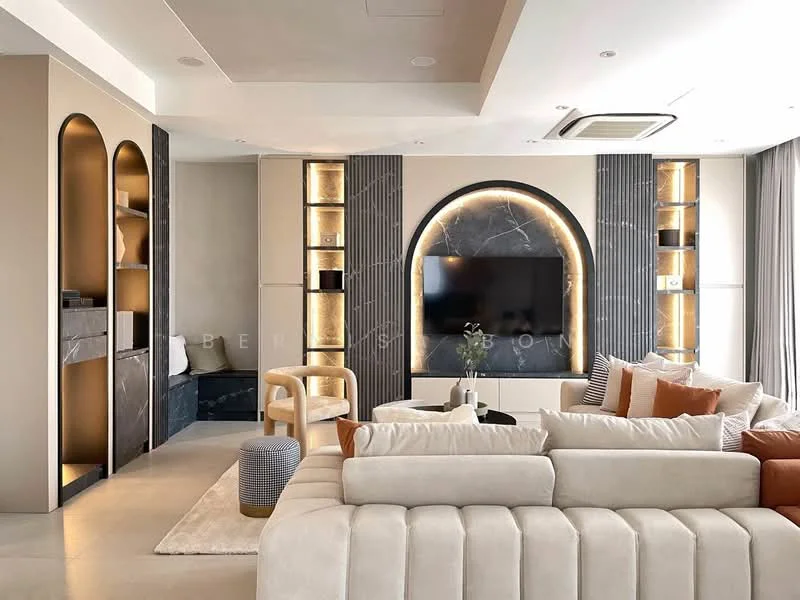 Living features: sofa with beige upholstery, accent pillows in orange and white, coffee table with round design, wall-mounted TV, built-in cabinetry with backlighting, marble feature wall, recessed lighting, floor-to-ceiling windows with sheer curtains, decorative plant in ceramic pot, textured wall panels, open shelving with decorative items; style: modern.