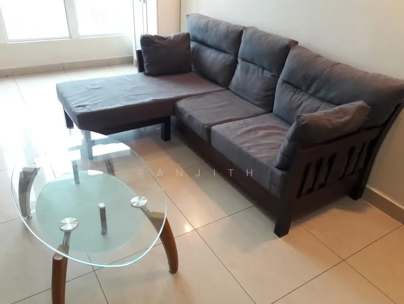 Living features: L-shape sectional sofa in grey fabric, glass coffee table with metal legs, large windows providing natural light, cream tiled flooring, neutral painted walls; style: modern.