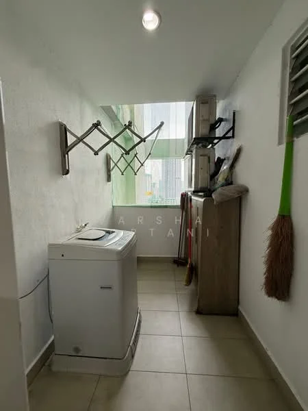 Laundry features: white front-load washing machine, tile flooring, white painted walls, window with green view, wooden shelving unit, folding drying rack, broom hanging on wall, natural light from window; view: city.