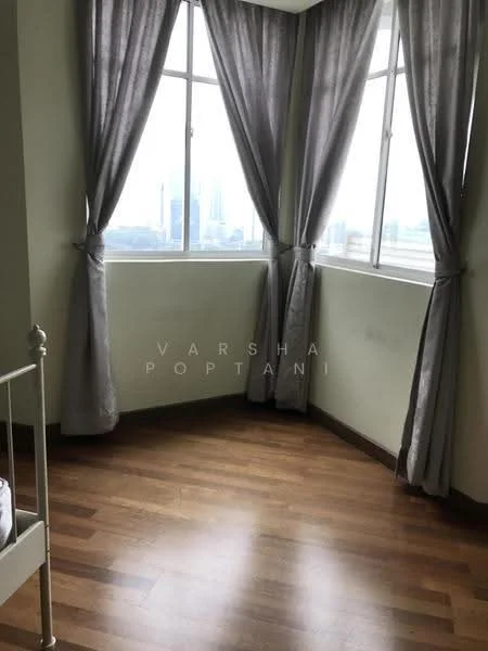 Room features: wooden flooring, light green painted walls, floor-to-ceiling windows, sheer curtains, grey curtains, city view; style: modern; view: city.