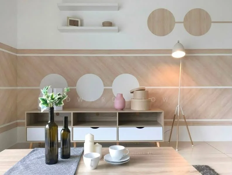 Living features: light wood flooring, white painted walls, decorative wall with circular patterns, shelf above the console, wooden console with drawers, floor lamp with tripod base, decorative vases in various colors, table with grey runner, white ceramic cups, candles, neutral color palette; style: modern.