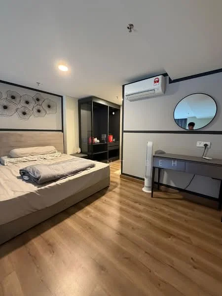 Bedroom features: queen-size bed with grey bedding, upholstered headboard, wooden flooring, wall-mounted air conditioning unit, round mirror, desk with chair, open shelving unit, decorative wall panel with geometric design, ceiling light, floor fan; style: modern.