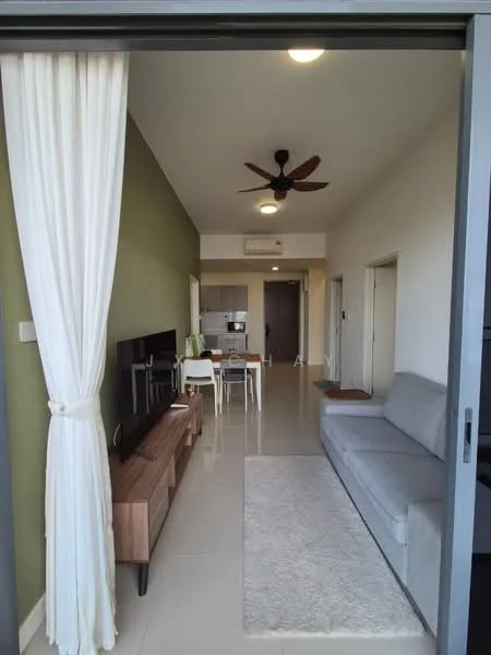 Living features: grey fabric sofa, wooden TV console, wall-mounted TV, area rug with geometric pattern, 5-blade ceiling fan, recessed downlights, cream curtains, white walls, light-colored tiled flooring, open layout to dining area, green accent wall; style: modern. Dining features: 4-seater dining table, white dining chairs, open kitchen layout, kitchen cabinetry, kitchen appliances visible; style: modern.