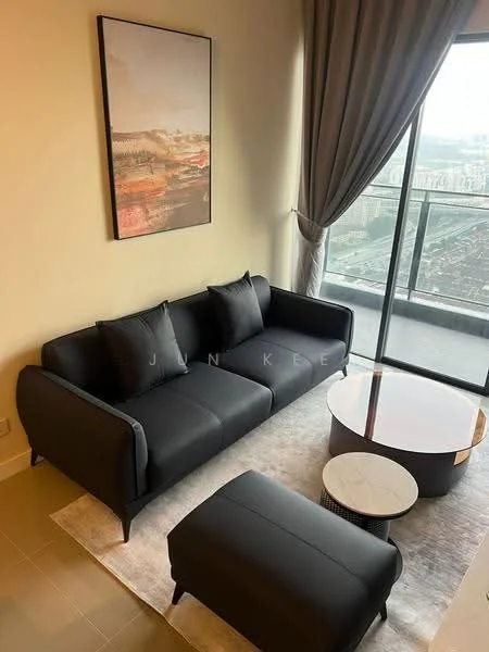 Living features: black leather 3-seater sofa, 2 black throw pillows, round coffee table with black base, light-colored area rug, framed artwork on wall, floor-to-ceiling windows, curtains in light fabric, city view visible through windows; style: modern; view: city.