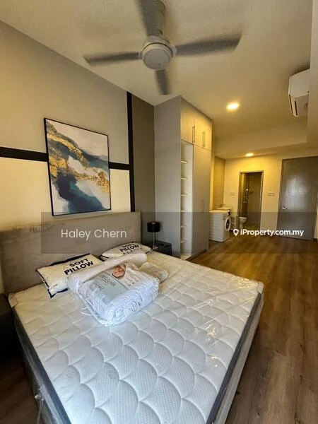 Bedroom features: queen-size bed with mattress protector, upholstered headboard, 2 bedside pillows, ceiling fan, wooden flooring, built-in wardrobe with sliding doors, framed artwork on wall, wall-mounted air conditioning unit, neutral wall color, light-colored bedding; style: modern.