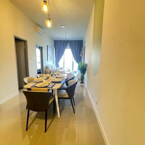 Dining features: 6-seater dining table, white table with black placemats, beige upholstered dining chairs, pendant lighting with three bulbs, large window with sheer curtains, light grey walls, cream tiled flooring, decorative plant in corner; style: modern. Living features: sofa with light upholstery, coffee table, floor-to-ceiling window, curtains in grey, wall-mounted air conditioning unit; style: modern.