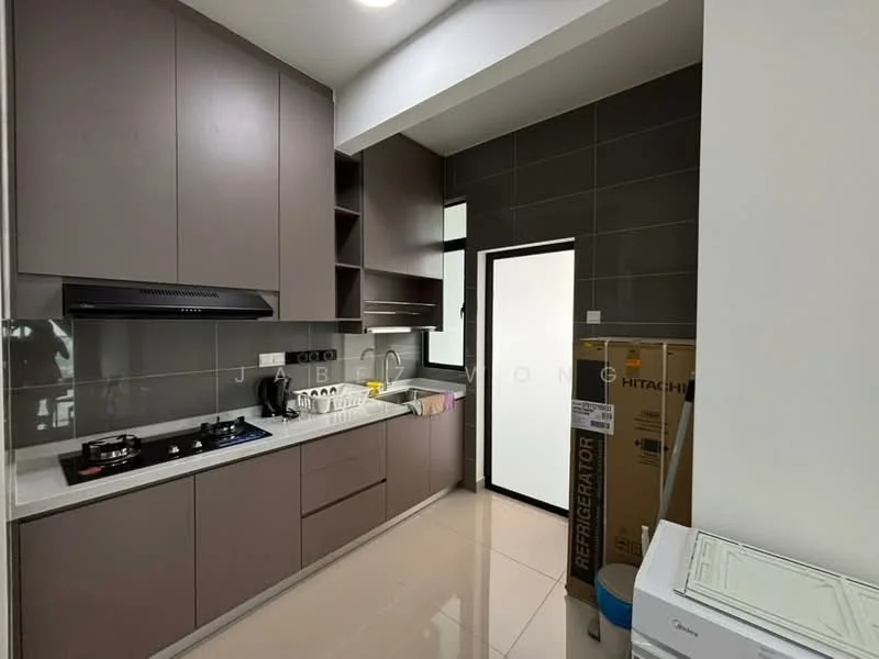 Kitchen features: dark grey tiled walls, white quartz countertop, brown cabinetry with flat-panel design, stainless-steel sink, chrome pull-down faucet, built-in gas hob, stainless-steel range hood, refrigerator box visible, floor-to-ceiling cabinet, light-colored tile flooring, window with black frame, open shelving; style: modern. Laundry features: top-load washing machine, white cabinetry, space for additional appliances.