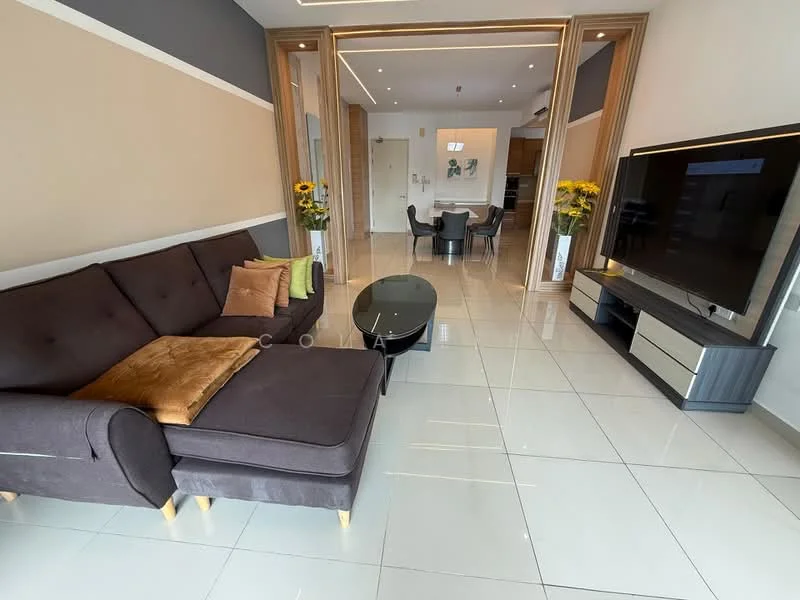 Living features: L-shape sectional sofa in dark grey, decorative cushions in various colors, glass coffee table, wall-mounted flat-screen TV, TV console with storage, white tiled flooring, recessed ceiling lights, wall paneling with wood accents, large windows for natural light, decorative wall art, potted sunflowers; style: modern.
