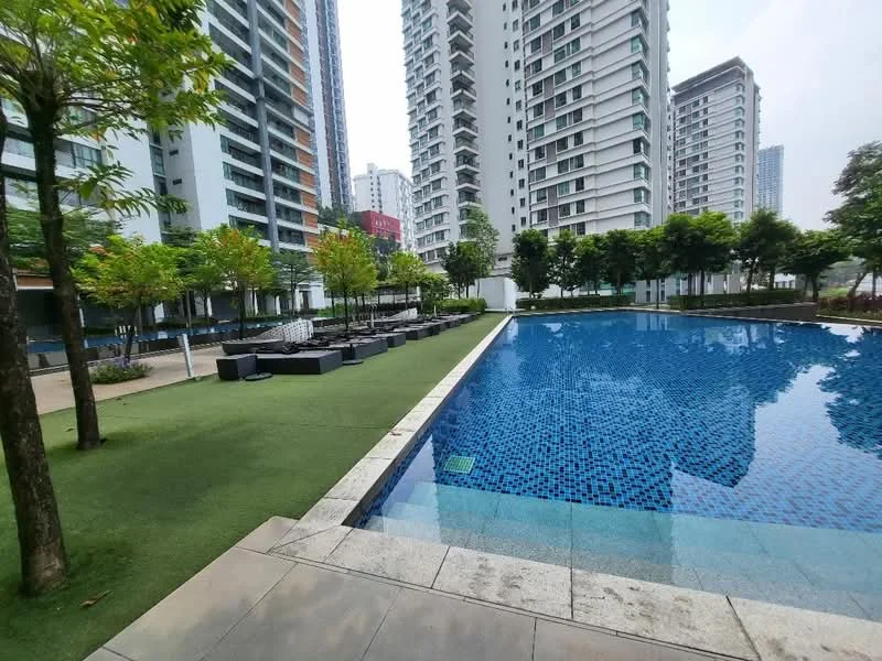 Exterior type: high-rise condominium; features: infinity pool, pool deck with loungers, manicured lawn, mature trees, landscape garden, surrounded by high-rise buildings; style: modern.
