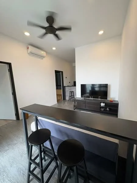 Living features: 5-blade ceiling fan with light, wall-mounted TV, black TV console, grey sofa, black bar stools, open layout, recessed downlights, air conditioning unit, light-colored flooring, neutral wall color; style: modern.