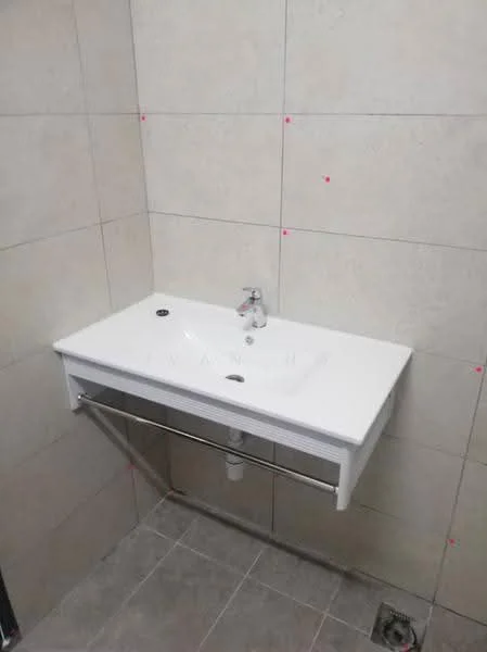 Bathroom features: white ceramic sink, chrome basin mixer faucet, wall-mounted sink, grey tiled walls, light grey tiled flooring, metal towel bar; style: modern.