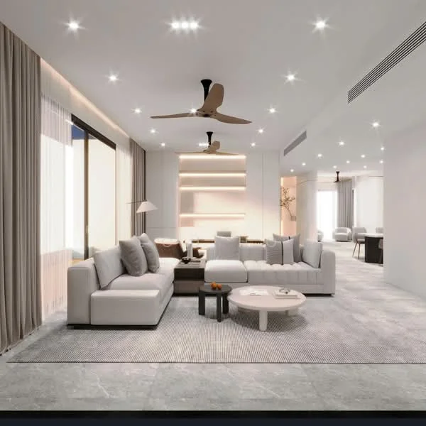 Living features: 3-seater fabric sofa in light grey, 2-seater fabric sofa in dark brown, round coffee table, area rug with striped pattern, floor-to-ceiling windows, sheer curtains, 5-blade ceiling fan with light, recessed LED downlights, wall-mounted TV, built-in shelving unit with ambient lighting, decorative plant, neutral painted walls, light grey tile flooring; style: modern; view: city.