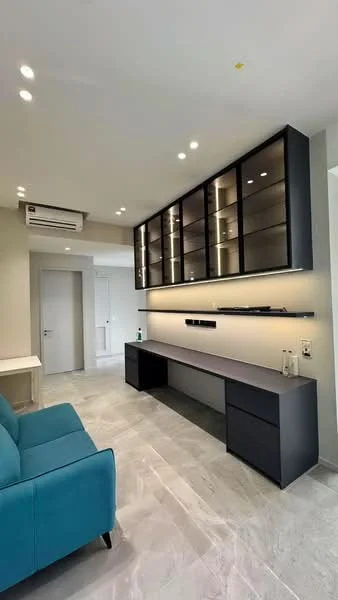 Living features: blue fabric sofa, wall-mounted TV console, open shelving unit with glass doors, recessed LED downlights, marble tile flooring, air conditioning unit, neutral painted walls, built-in cabinetry; style: modern.