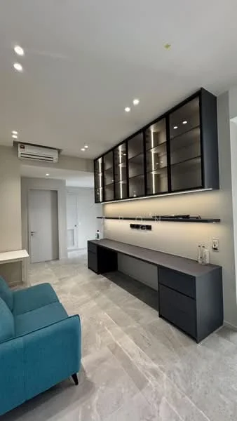 Living features: light grey marble flooring, blue fabric sofa, built-in wall unit with glass shelves, recessed LED downlights, wall-mounted air conditioning unit, neutral painted walls, console table, power outlets on the wall; style: modern.