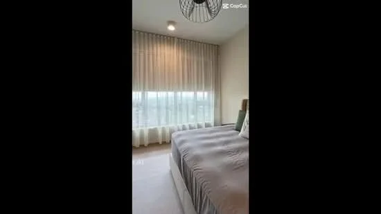 Bedroom features: king-size bed, upholstered headboard, bedside lamps, floor-to-ceiling windows, sheer curtains, carpet flooring, recessed downlights, decorative throw pillows; style: modern; view: city.
