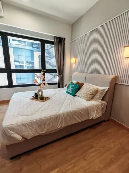 Bedroom features: king-size bed, upholstered headboard, white bedding, decorative pillows, wooden flooring, floor-to-ceiling windows, curtains, wall-mounted sconces, accent wall with vertical stripes, decorative tray on bed; style: modern; view: city.