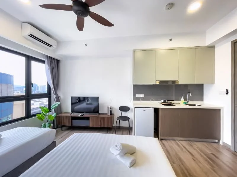 Living features: 2 single beds with white bedding, 5-blade ceiling fan with light, floor-to-ceiling windows, grey curtains, wall-mounted TV, wooden TV console, black dining chair, kitchenette with grey cabinets, stainless-steel sink, chrome pull-down faucet, black countertop, refrigerator, induction cooktop, green potted plant, wooden flooring; style: modern; view: city.