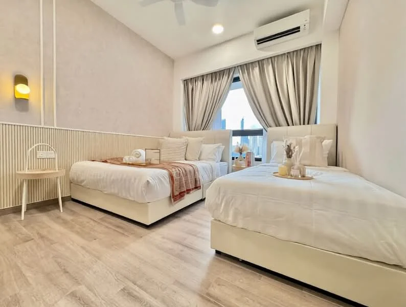 Bedroom features: two single beds with upholstered headboards, white bedding on both beds, plaid throw blanket on one bed, wooden bedside table, decorative vase on bedside table, floor-to-ceiling window with city view, sheer curtains, recessed ceiling lights, wall-mounted light fixture, wall paneling, laminate flooring, wall-mounted split AC; style: modern; view: city.