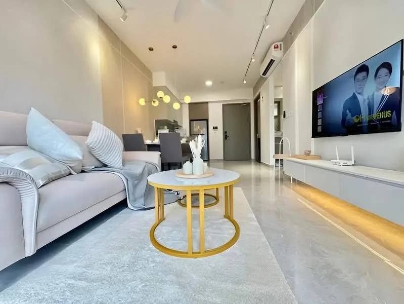 Living features: light grey fabric sofa, decorative cushions, golden coffee table with circular design, area rug with soft texture, wall-mounted TV, TV console with built-in lighting, recessed ceiling lights, ceiling fan, open layout to dining area, neutral painted walls, large windows for natural light; style: modern.
