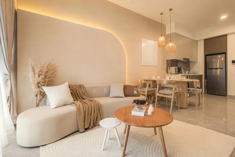 Living features: curved beige sofa, decorative throw blanket, round wooden coffee table, area rug with circular pattern, pendant lights with wooden accents, wall-mounted artwork, light-colored walls, grey tile flooring, floor-to-ceiling windows with sheer curtains, dining table with chairs, kitchenette with stainless-steel fridge; style: modern.