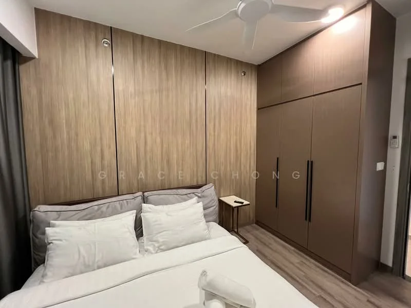 Bedroom features: queen-size bed with white bedding, wooden headboard, built-in wardrobe with wood finish, wall-mounted bedside table, grey curtains, ceiling fan with light, laminate flooring, accent wall with wood paneling; style: modern.