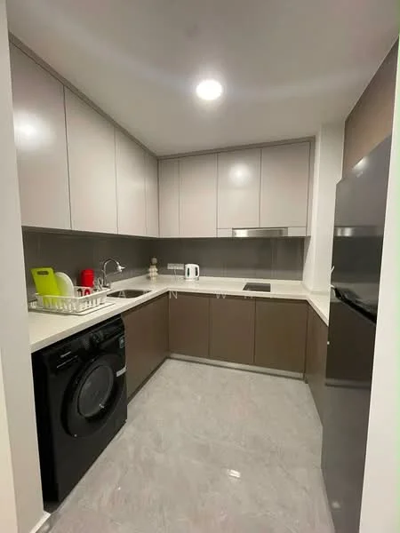 Kitchen features: white upper cabinets, brown lower cabinets, stainless-steel countertop, single-bowl stainless-steel sink, chrome pull-down faucet, built-in induction cooktop, black front-load washing machine, stainless-steel refrigerator, grey tile flooring, recessed downlights, wall-mounted kitchen hood, dish drying rack, kettle, white ceramic mug; style: modern.