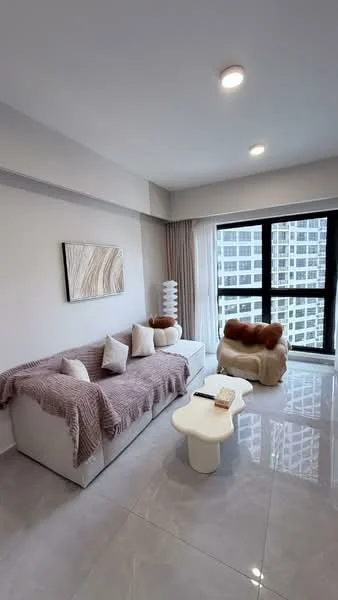 Living features: white fabric sofa with throw pillows, plaid throw blanket, white coffee table, decorative fur throw, floor-to-ceiling windows, curtains, polished ceramic tile flooring, recessed downlights, framed artwork on wall, accent chair in cream color; style: modern; view: city.