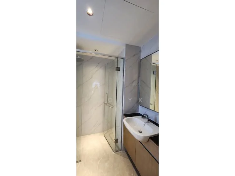 Bathroom features: glass shower enclosure, rain shower head, single-sink vanity with wood cabinet, white ceramic sink, chrome basin mixer, framed mirror, tile cladding on walls, light-colored tile flooring, recessed downlights; style: modern.